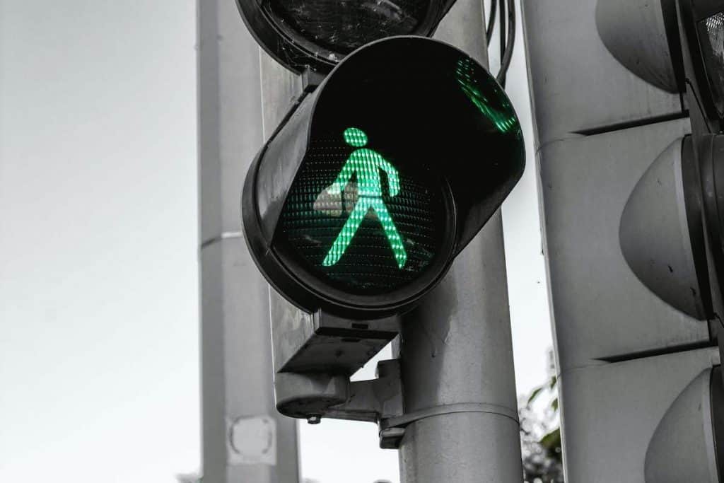 NPCrowd - Don't be stuck with your nonprofit growth. Choose Nonprofit Strategy. - Crosswalk Green Walk light.