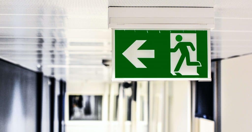 NPCrowd - Nonprofit Turnover is a problem. Photograph of exit sign.